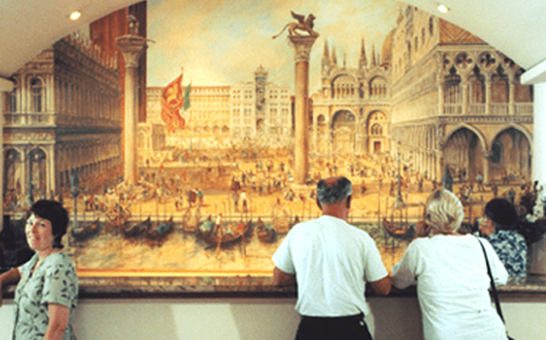 Visitors observing Venice scene painting