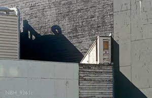 Abstract shadows on textured wall