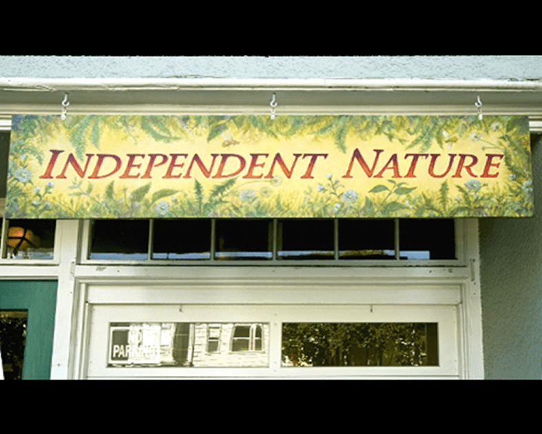 Storefront sign reading "Independent Nature