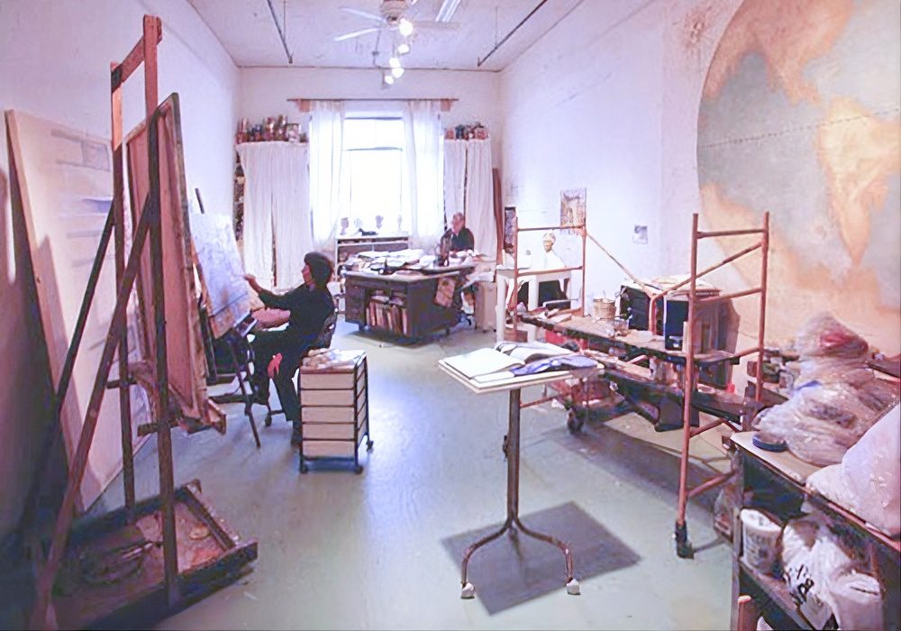 Creative workspace with canvases and supplies